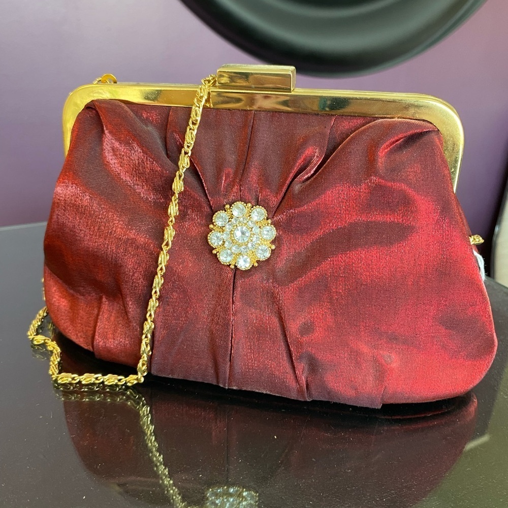 Elegant Red Clutch with Gold Chain